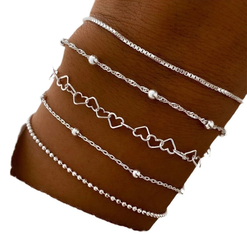 "Pulseiras Golden Charm: Conjunto 5 em 1 para um Estilo Sofisticado!"